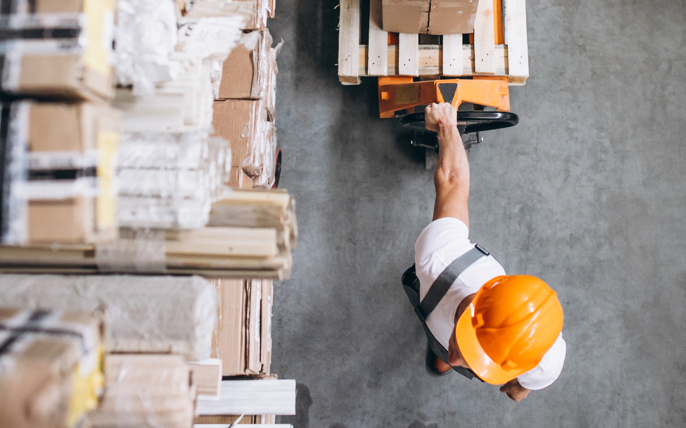 young-man-working-warehouse-with-boxes_1